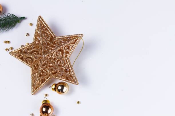 istock Christmas flat lay scene with golden decorations 963191476