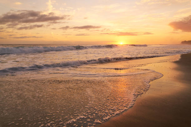 Sunset at Coronado Beach with breaking surf,San Diego,CA