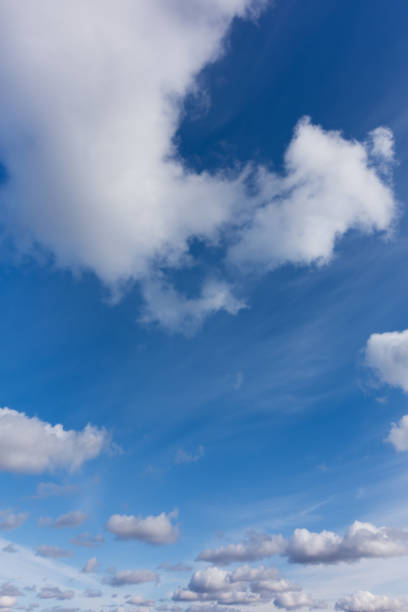 istock Beautiful high sky, clouds flying against blue sky. 963195934