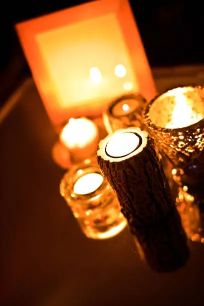 Photo of Lit Candles in The Dark