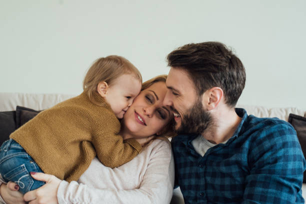 istock Adorable family with a child 963196240