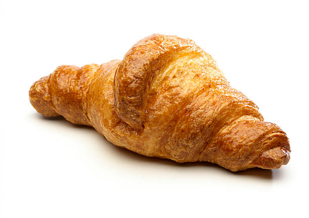istock Honey croissant against white background 96320286