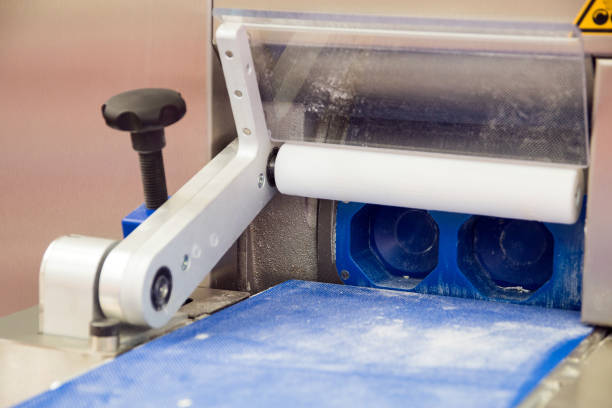 istock Empty conveyor belt for bread factory 963212042