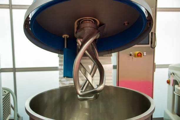 istock Dough kneading machine in production close-up 963212278