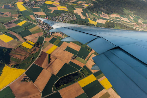 istock Spring scenery from the air through the airplane window 963216626