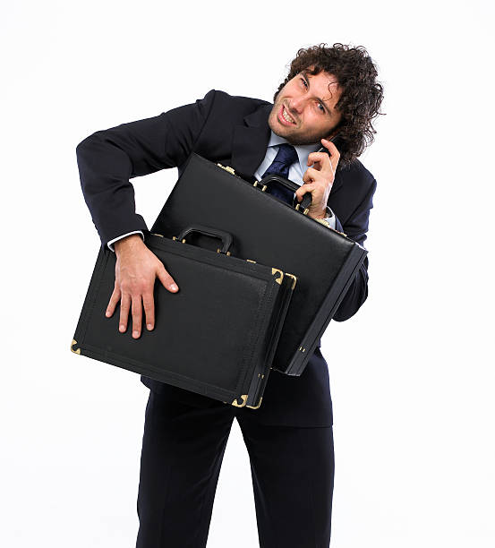 istock busy man whit briefcase and mobile phone 96321795