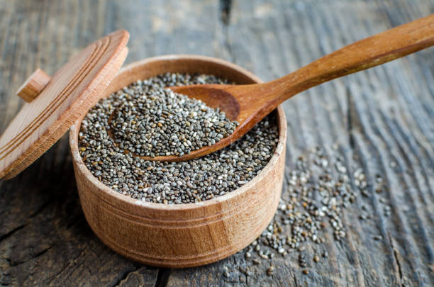 istock Healthy Chia seeds in a wooden bowl 963219998