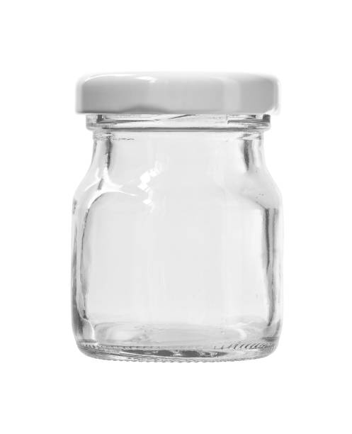 istock Round Shape Small Glass Canister White Cap isolated on white background 963221534