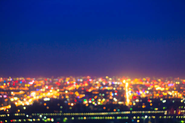 istock Blurred nighttime scene of a city  bokeh 963223104