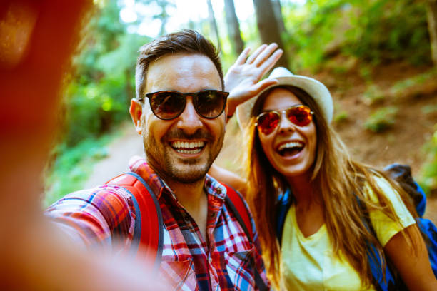 istock Couple hiking and having fun 963230652