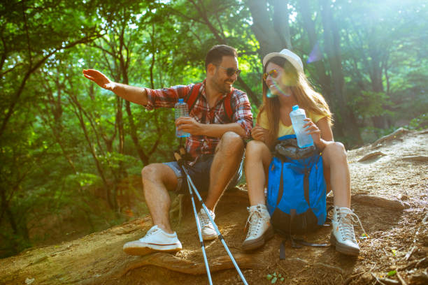 istock Couple hiking and having fun 963231600