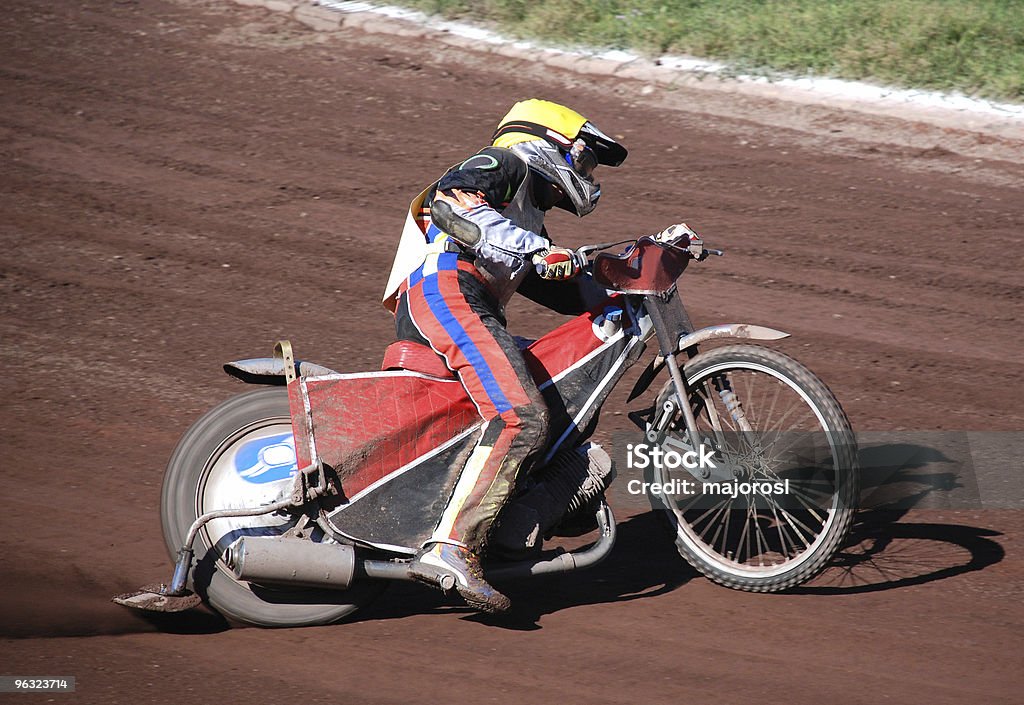 coureur de Speedway - Photo de Championnat de Moto de Vitesse sur Piste libre de droits