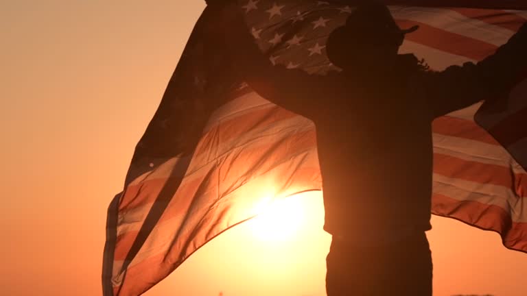 Caucasian Cowboy with American Flag in Slow Motion