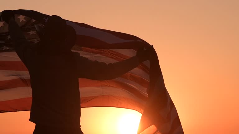 United States of America Independence Day Celebration. Men with American Flag in Slow Motion