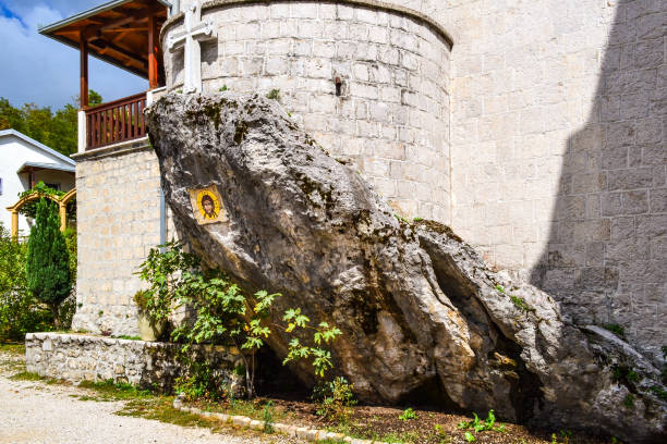 Budva, Montenegro. 11 May 2025. People outside Church of St. Sabba the Sanctified in Budva