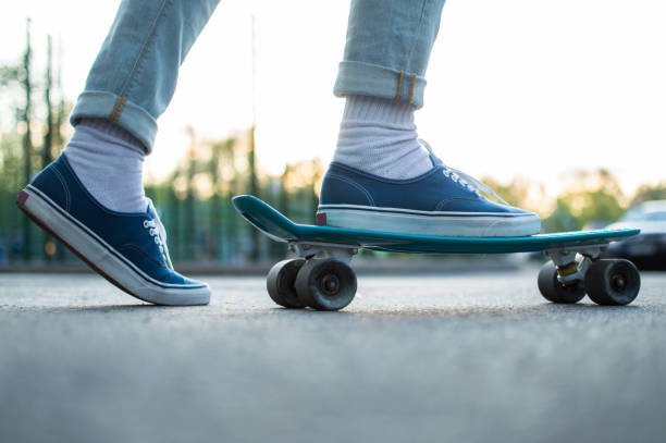 istock hipster penny skateboard shoes outdoor activity 963244976