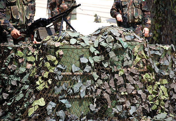 istock soldiers at the roadblock 96324551