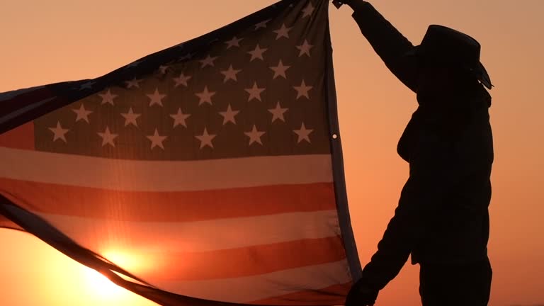 Slow Motion Footage of Cowboy with United States of America Flag in Slow Motion