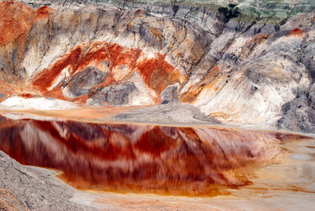 istock Canyon in the desert with a lake with red water 963260952