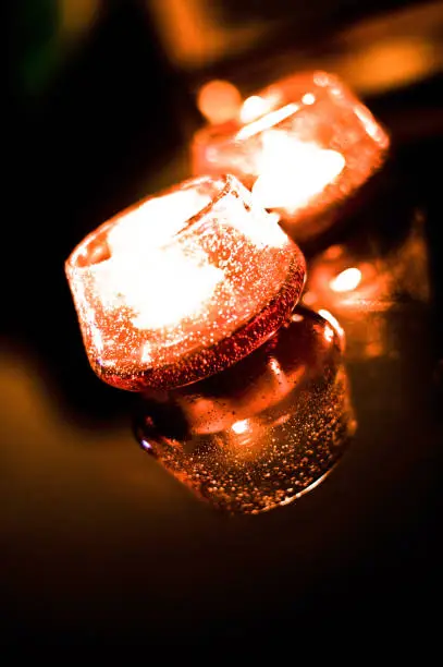 Photo of Lit Candles in The Dark