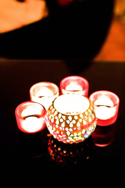 Photo of Lit Candles in The Dark