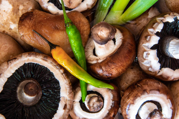 Mushrooms with spring onion and chillies