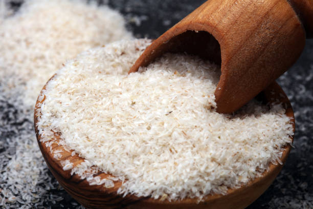 istock Portion of Psyllium Seeds on rustic dark background. Psyllium seed husks 963270276