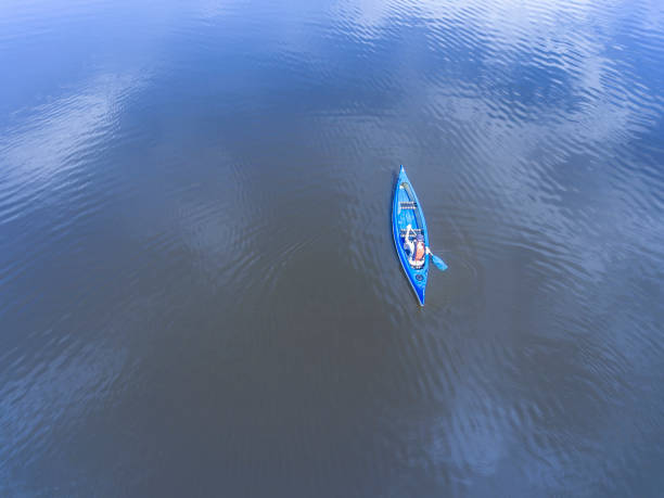 istock Aerial view over a canoe in the swedish archipelago. 963276204