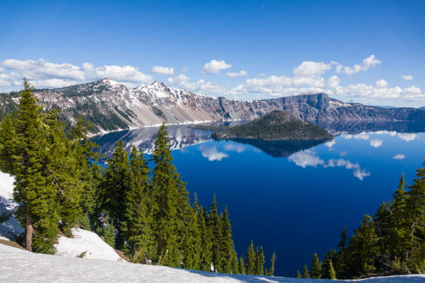 istock Crater Lake In Springtime with Snow 963282860