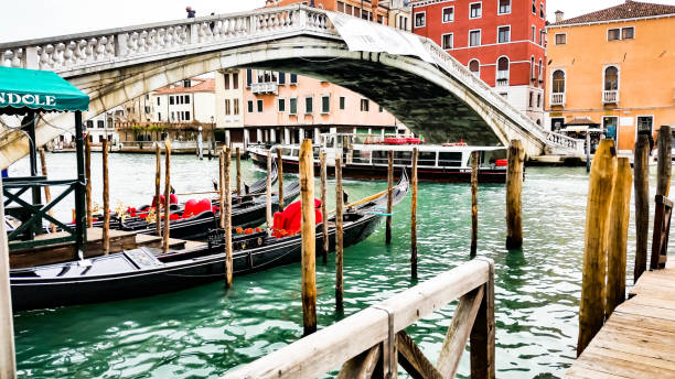 istock Gondolas under bridge of sighs in Venice 963288448