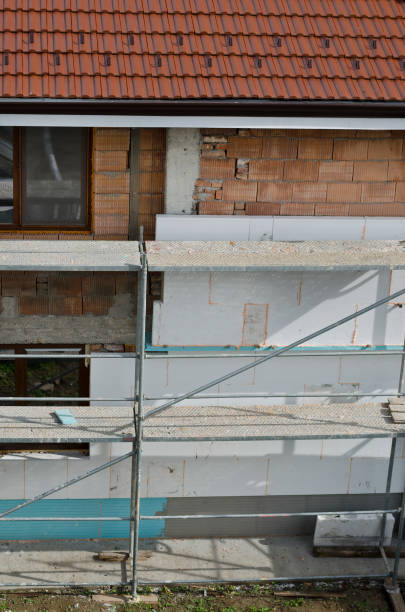 istock Repairing the walls and putting an insulation 963303262