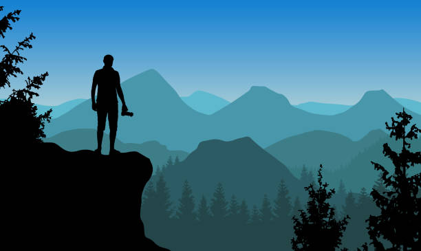 ilustrações de stock, clip art, desenhos animados e ícones de vector landscape with a man standing on a cliff holding camera and watching blue misty mountains. - layered mountain peak summer light