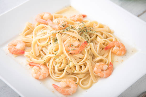 istock shrimp with Fettuccine 963317312
