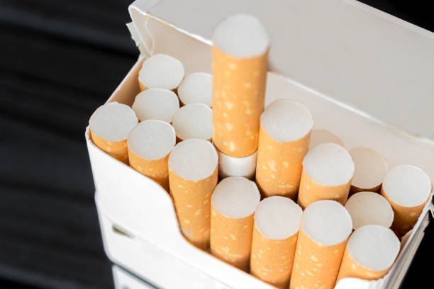 istock a pack of cigarettes is on a table made of ebony 963319430