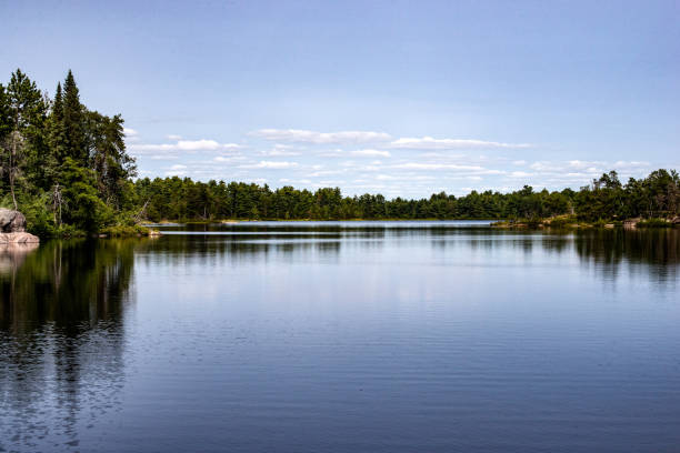 Scenic view of the French River, Ontario, Canada A tranquil scenic image of the French River, a heritage river with historical significance in central Ontario, Canada. Photo taken in one of the remote back country campsites of the French River Provincial Park. great lakes photos stock pictures, royalty-free photos & images