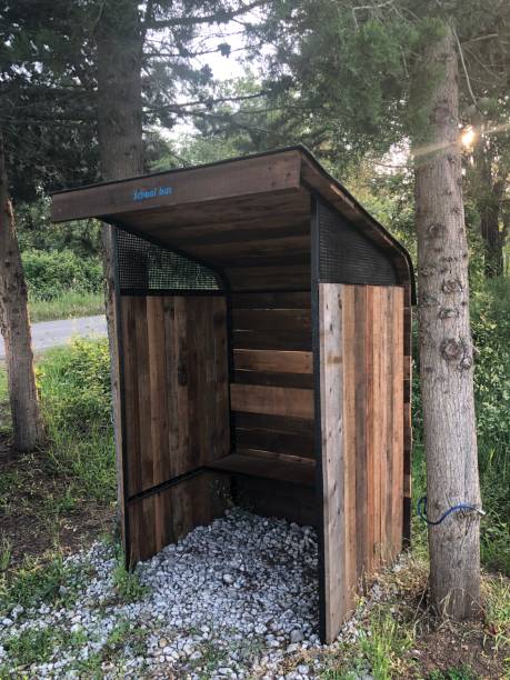 istock Little wooden rural school bus stop 963333430
