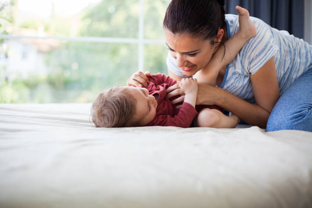 istock mother and baby enjoying together 963333762