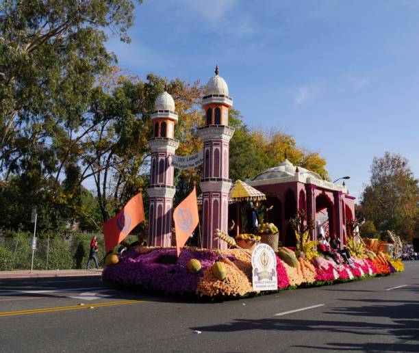 2018 Tournament of Roses Parade-the United Sikh Misison float PASADENA, CALIFORNIA—JANUARY 1, 2018: Back view of the United Sikh Misison float, representing Sikh Langar, the world’s largest kitchen at the  2018 Tournament of Roses Parade. tournament of roses stock pictures, royalty-free photos & images