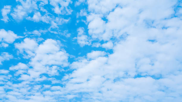 istock Many clouds and azure sky background.The atmosphere in the blue sky with copy space 963346476