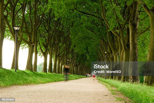 Countryroad With Runners Stock Photo - Download Image Now - Backgrounds, Beautiful People, Beauty