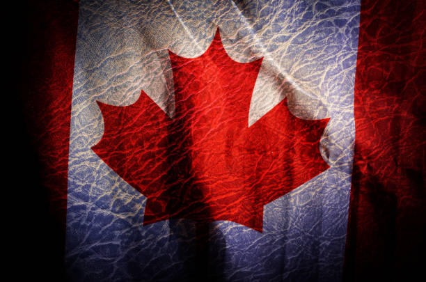 istock Canada flag,Grunge filtered background 963350612