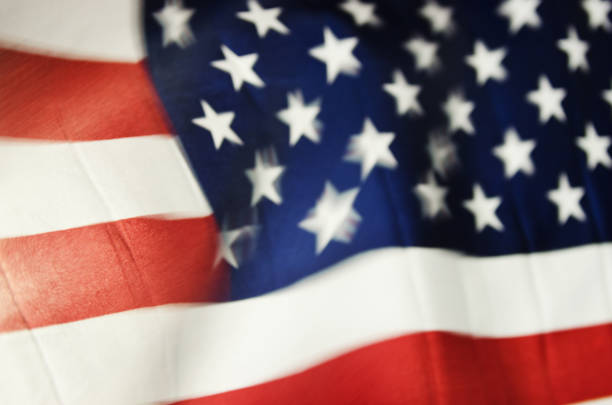 istock American Flag Flying in Night Wind 963350616