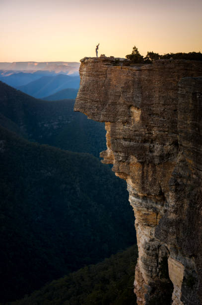 istock Happy girl on mountain peak 963351834