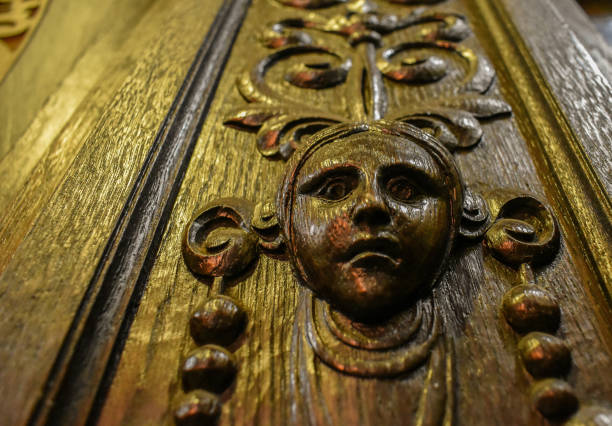 Wood door with a face carved