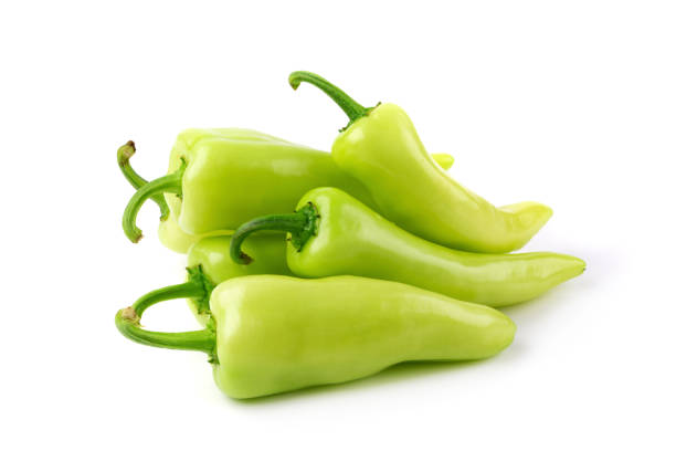istock Green hot chili peppers isolated on white background 963362690
