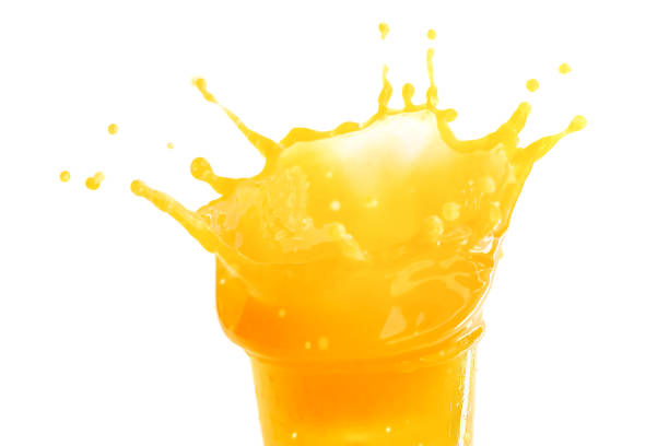 istock Orange juice splashing isolated on a white background 963362788