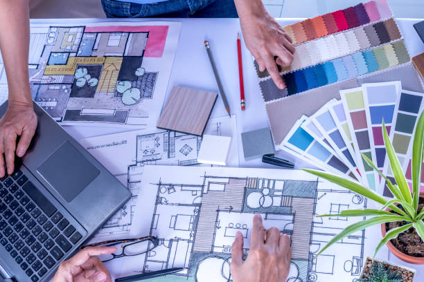 istock Architect, interior designer working at office table / Home renovation & decoration conceptual 963370202