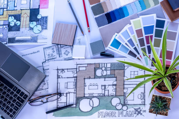 istock Architect, interior designer's worktable in office / Home renovation & decoration conceptual 963370654