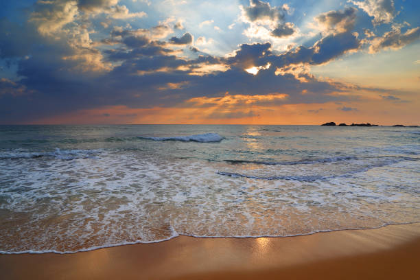 istock landscape with sea sunset on beach 963374678