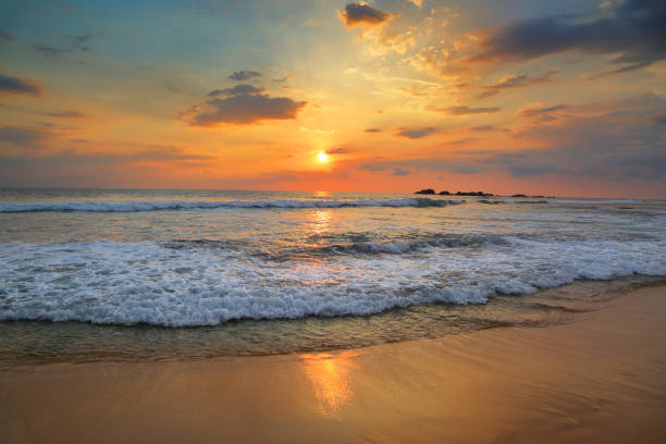 istock landscape with sea sunset on beach 963374690